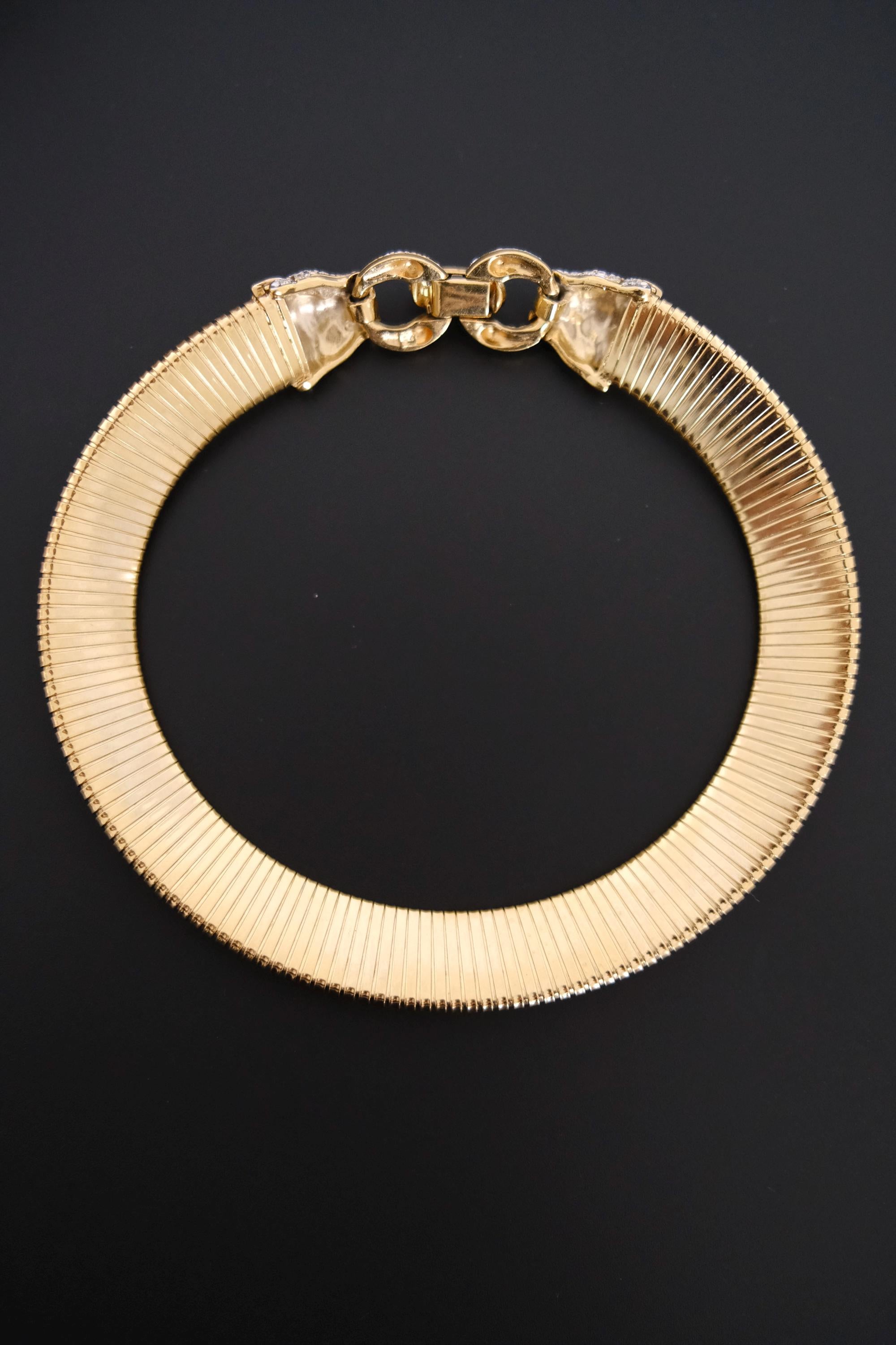 Vintage Vogue Bijoux gold-tone collar choker with two crystal pavé feline heads and hidden front closure
