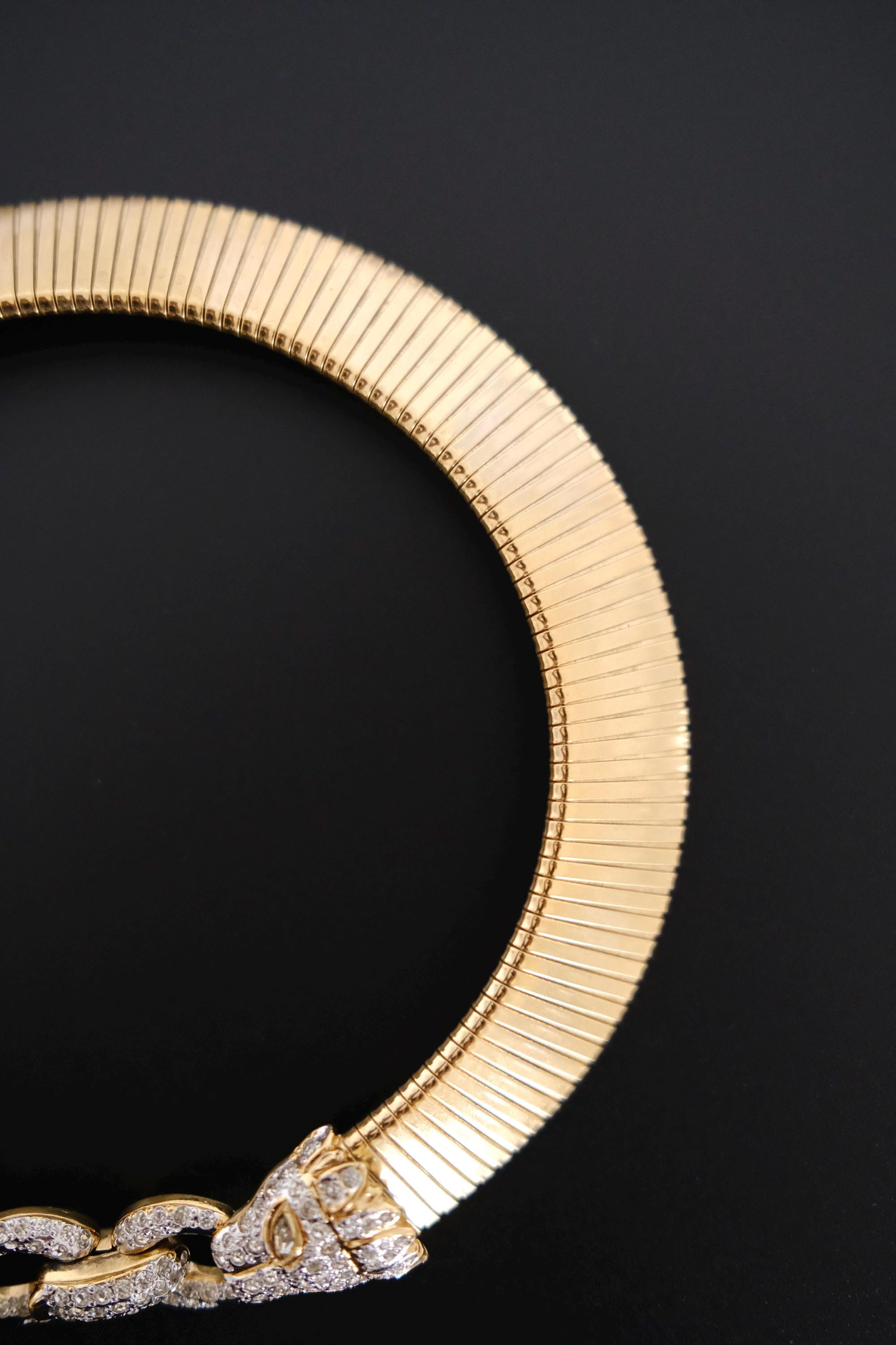 Vintage Vogue Bijoux gold-tone collar choker with two crystal pavé feline heads and hidden front closure