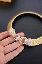 Vintage Vogue Bijoux gold-tone collar choker with two crystal pavé feline heads and hidden front closure