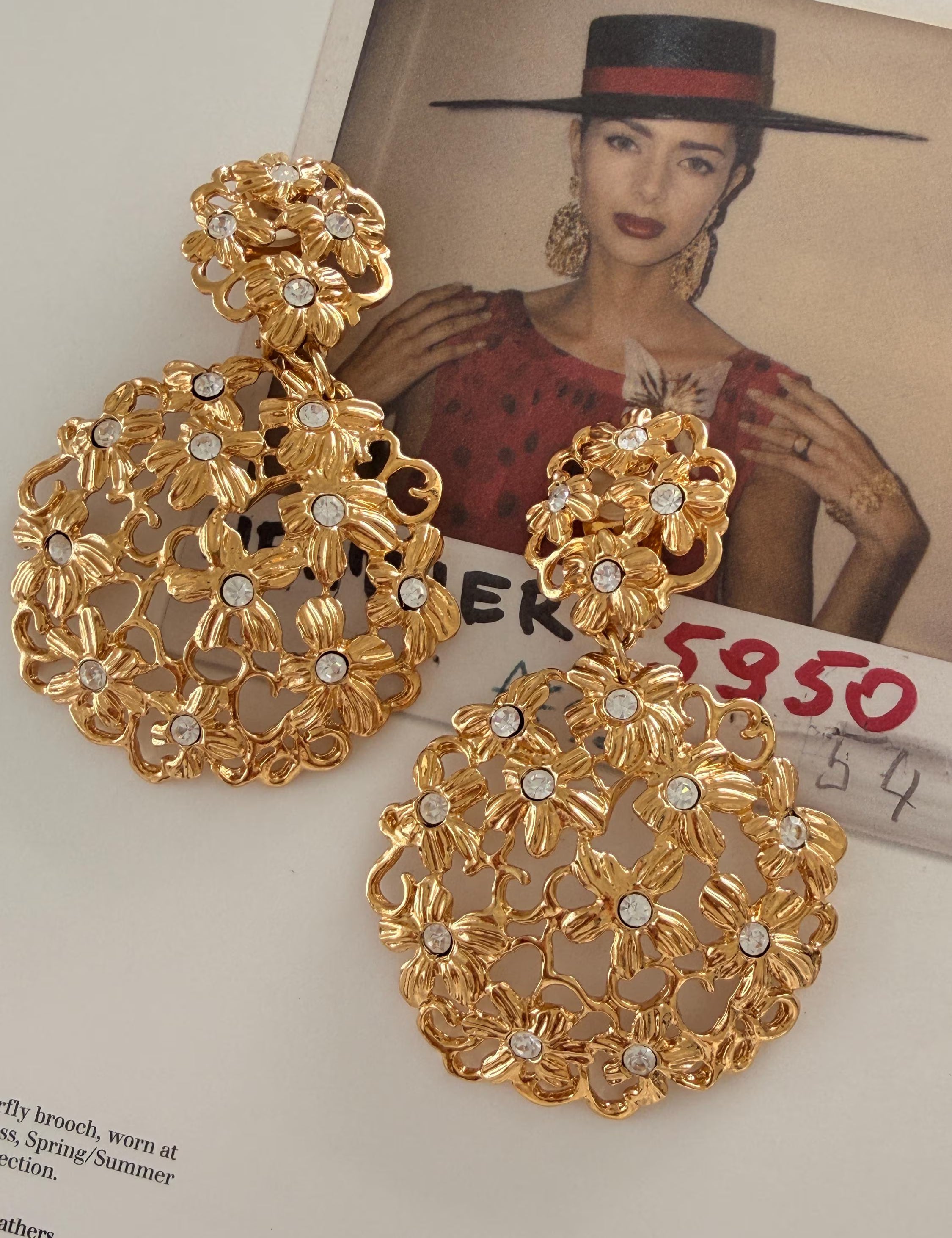 Luxury vintage YSL gold floral statement earrings with rhinestones for elegant women