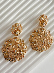 Vintage Yves Saint Laurent gold floral statement earrings bold elegant luxury jewelry