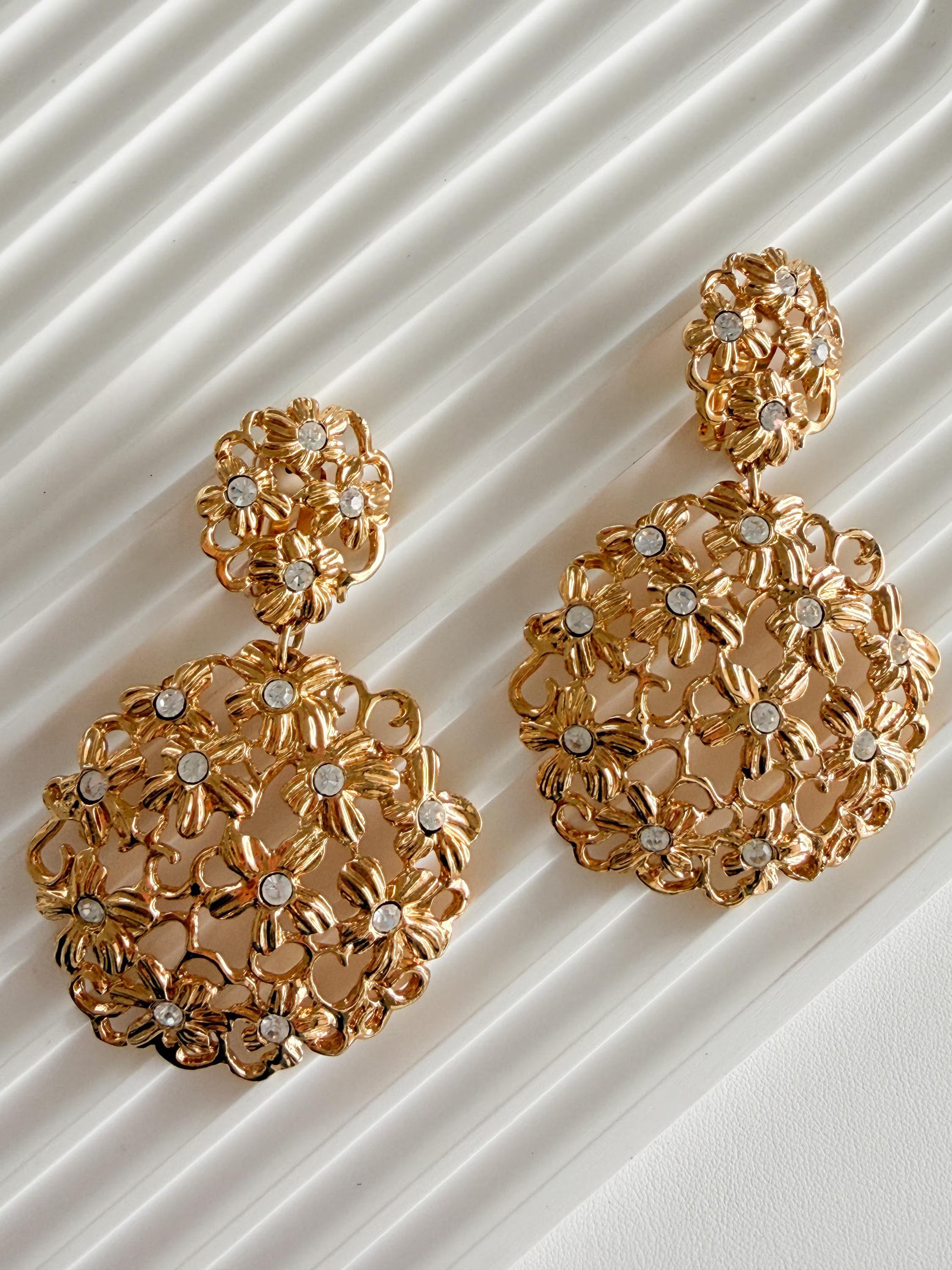 Vintage Yves Saint Laurent gold floral statement earrings bold elegant luxury jewelry