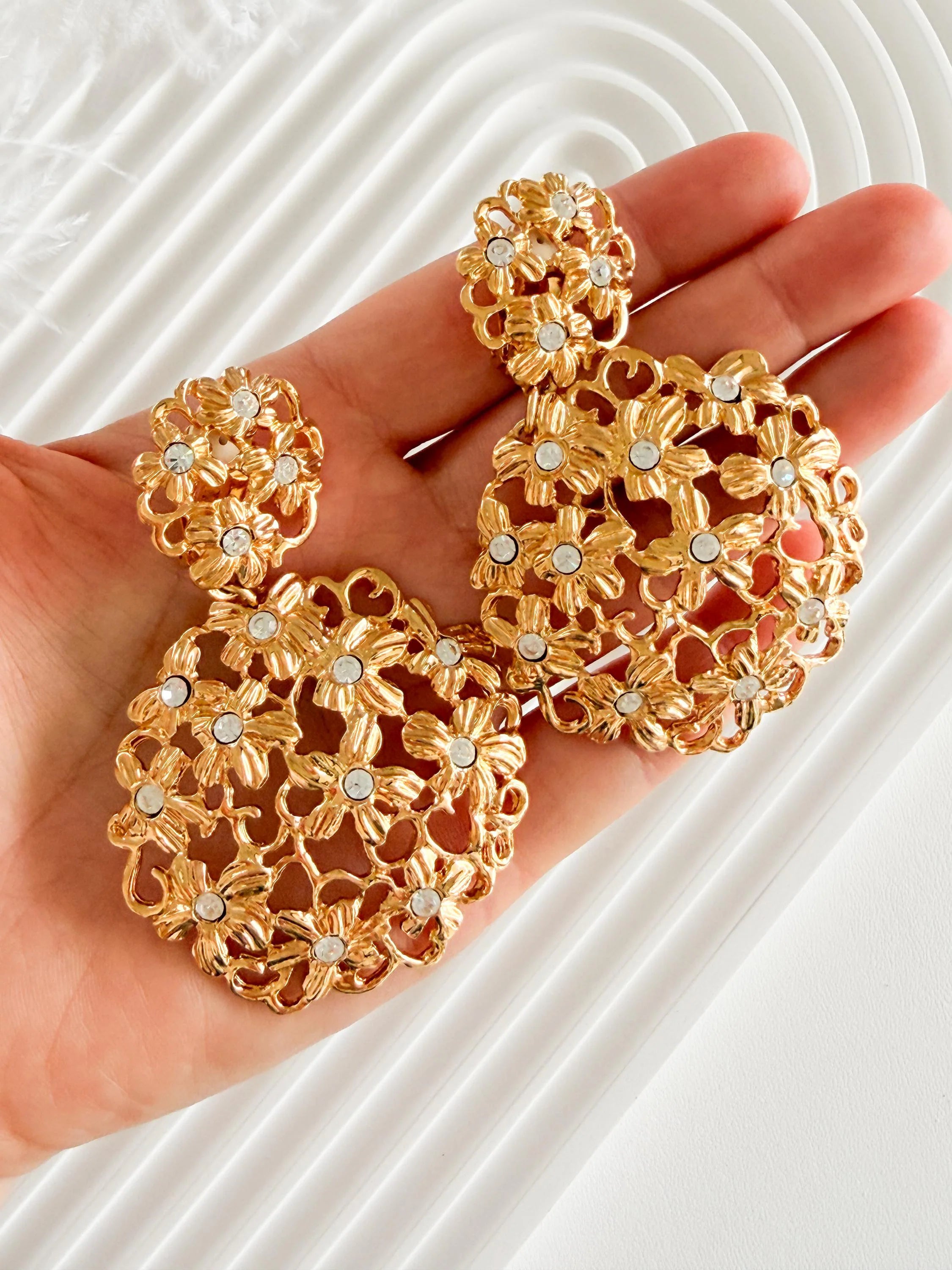 Vintage Yves Saint Laurent gold floral statement earrings bold elegant luxury jewelry