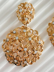Large YSL statement earrings size view bold gold floral luxury accessory