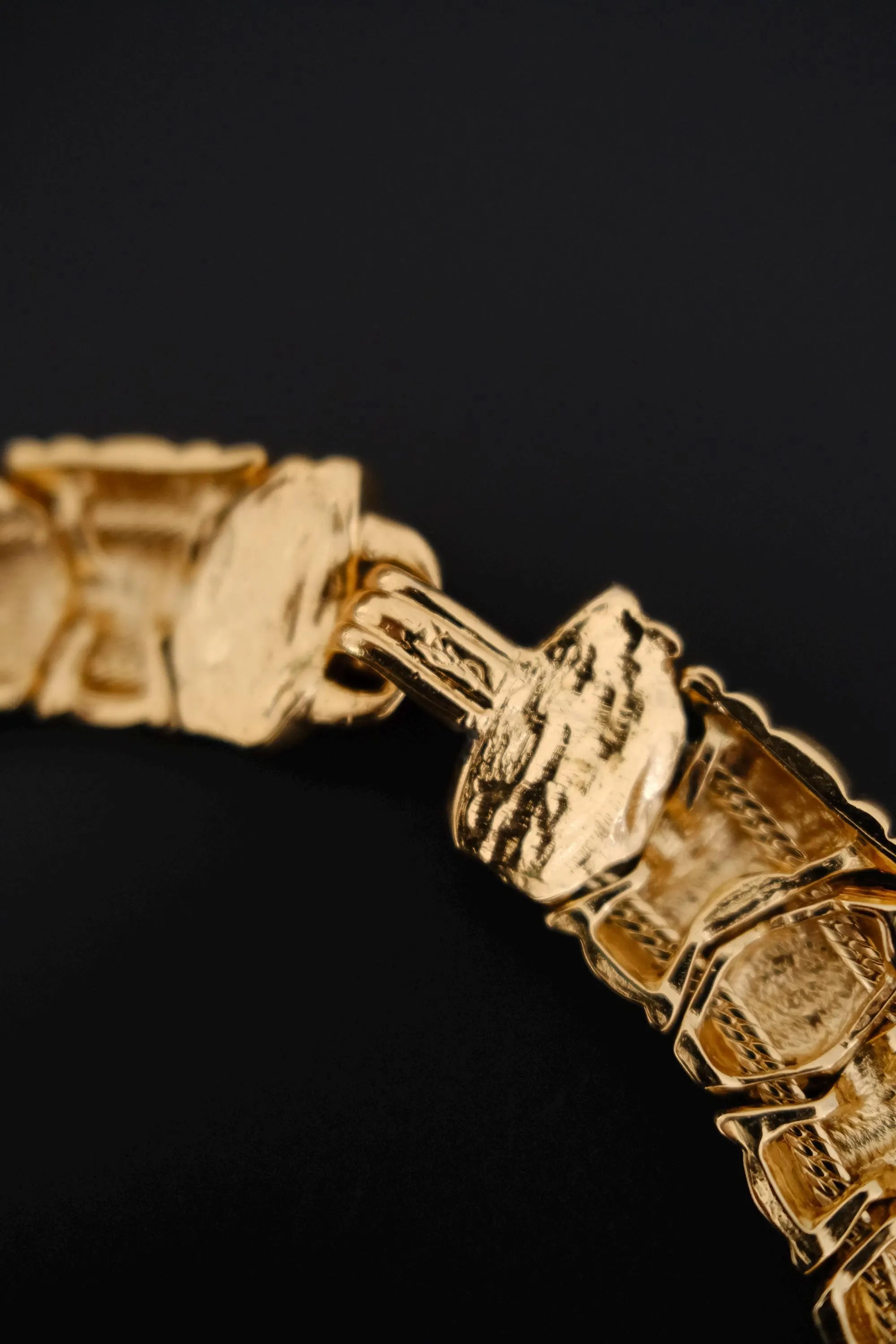 Detailed view of closure mechanism on vintage Yves Saint Laurent crystal choker necklace