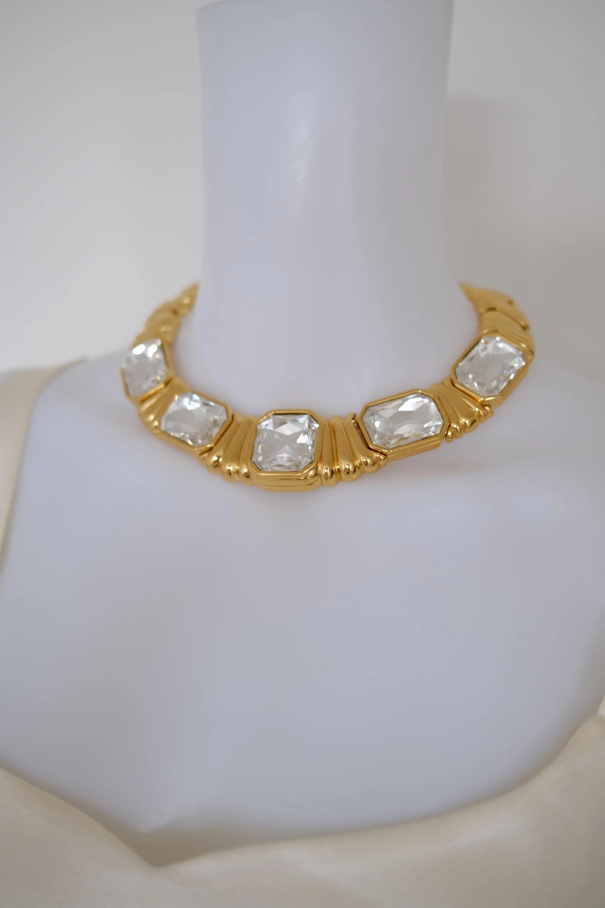 Vintage Yves Saint Laurent gold-tone crystal choker necklace with five oversized clear faceted geometric crystals, made in France