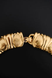 Detailed view of closure mechanism on vintage Yves Saint Laurent crystal choker necklace