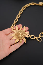 Vintage Yves Saint Laurent YSL gold-tone statement necklace with oversized sculptural sunflower pendant