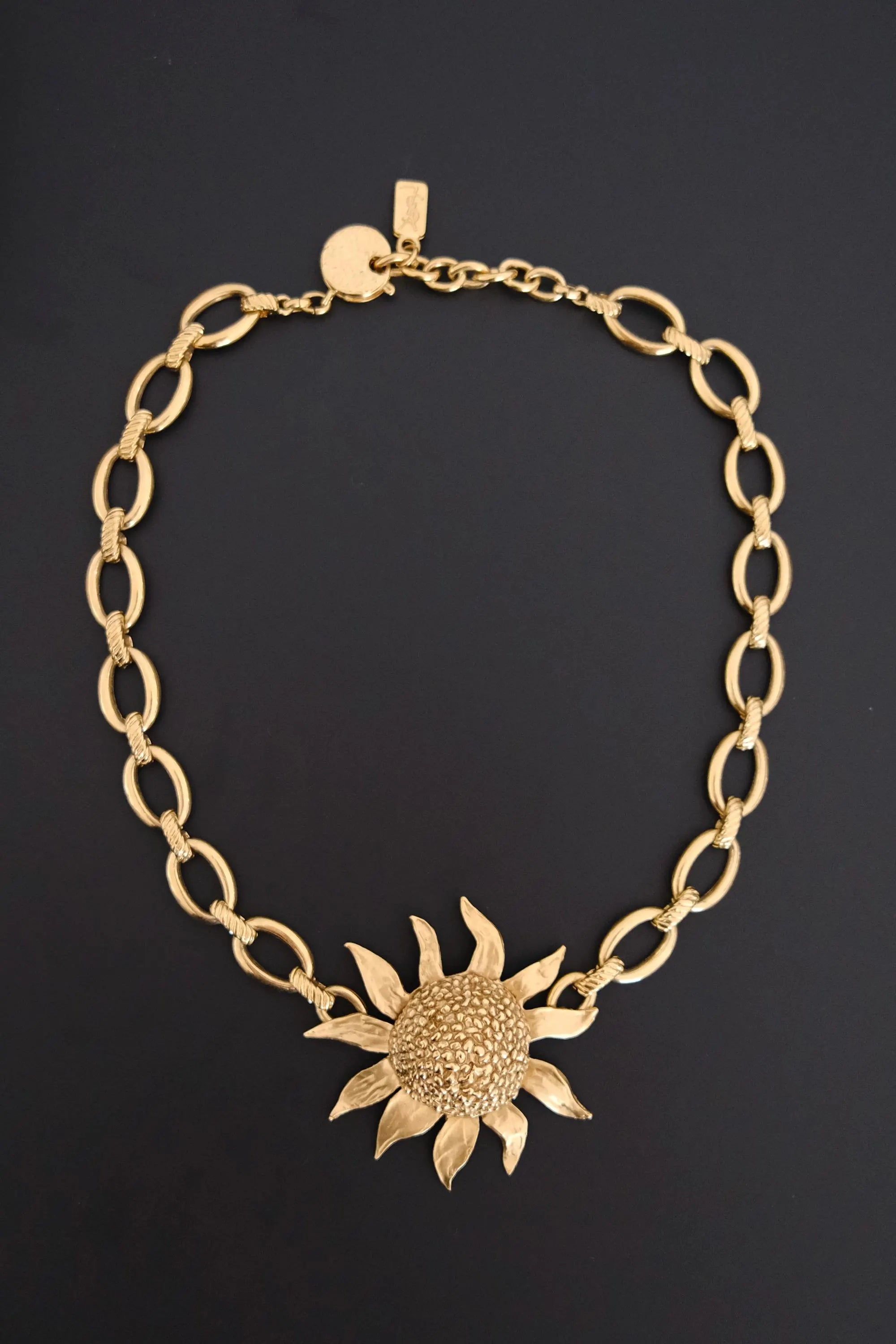 Vintage Yves Saint Laurent YSL gold-tone statement necklace with oversized sculptural sunflower pendant