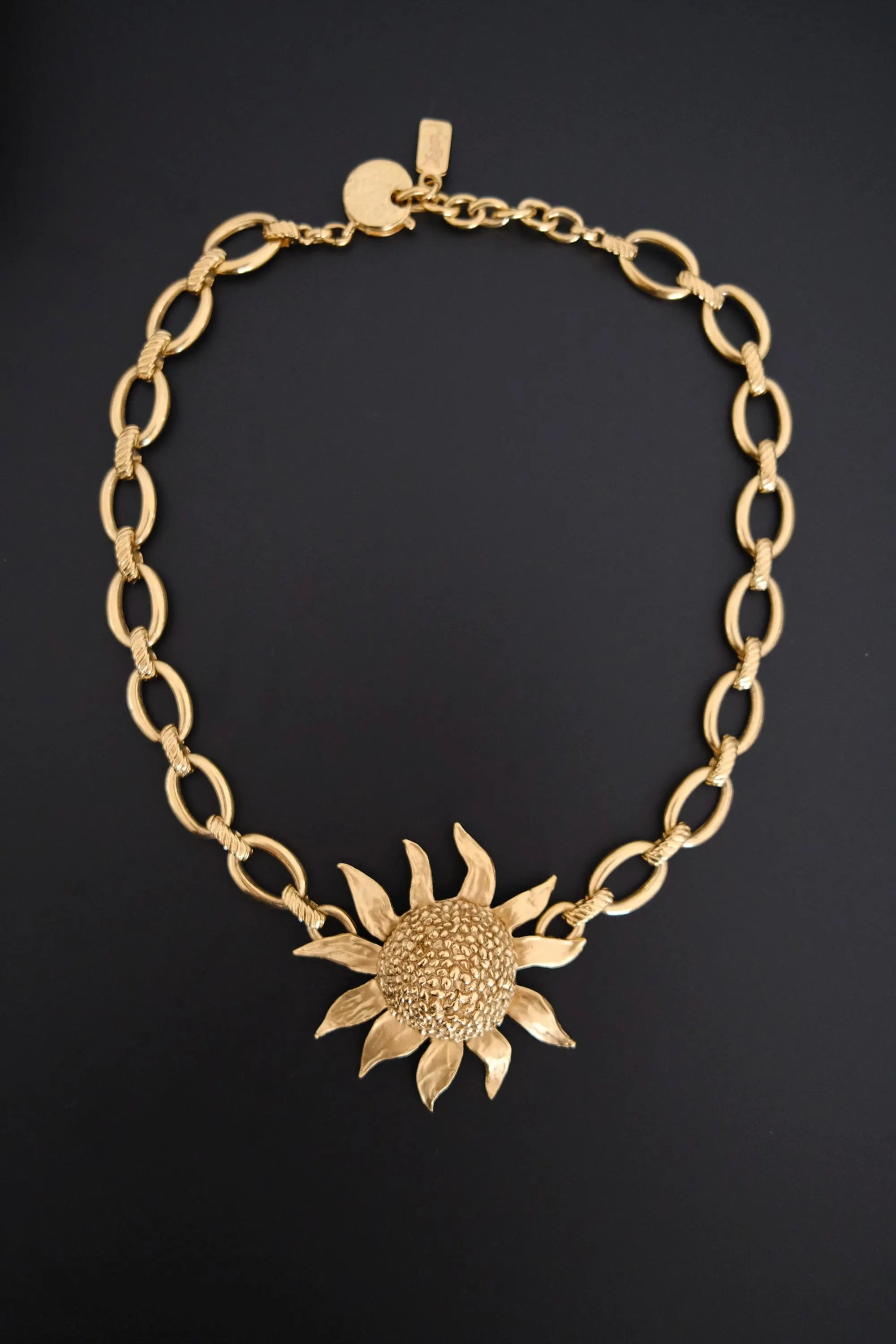 Vintage Yves Saint Laurent YSL gold-tone statement necklace with oversized sculptural sunflower pendant
