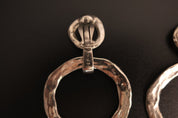 Vintage Yves Saint Laurent Hoop Earrings Close Up Showing YSL Signature on Clip Backs