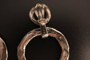 Vintage Yves Saint Laurent Hoop Earrings Close Up Showing YSL Signature on Clip Backs