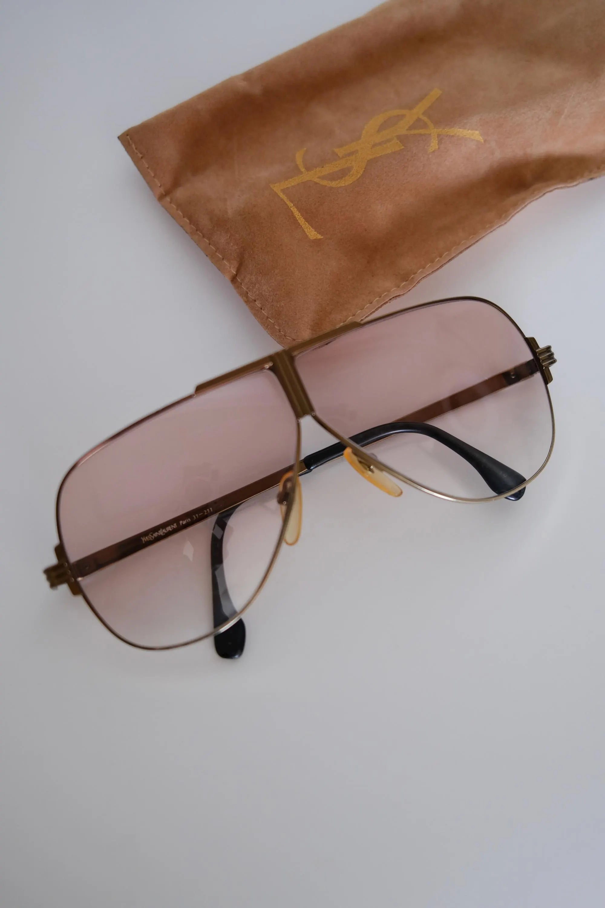 Original Yves Saint Laurent logo pouch included with vintage YSL Paris 31-211 brown aviator sunglasses