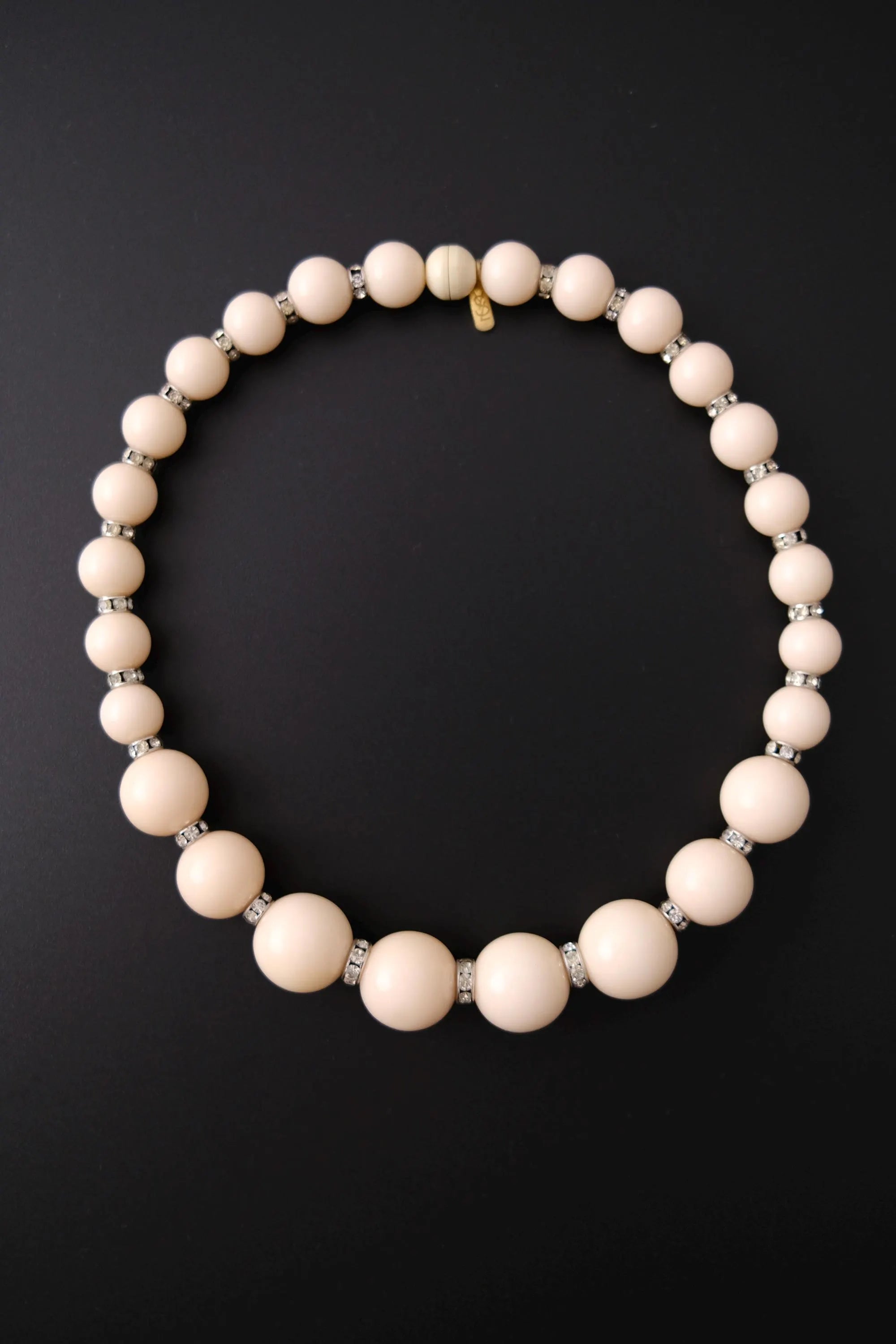 Vintage Yves Saint Laurent YSL beige beaded choker necklace with sparkling clear crystal rhinestone rondelle spacers