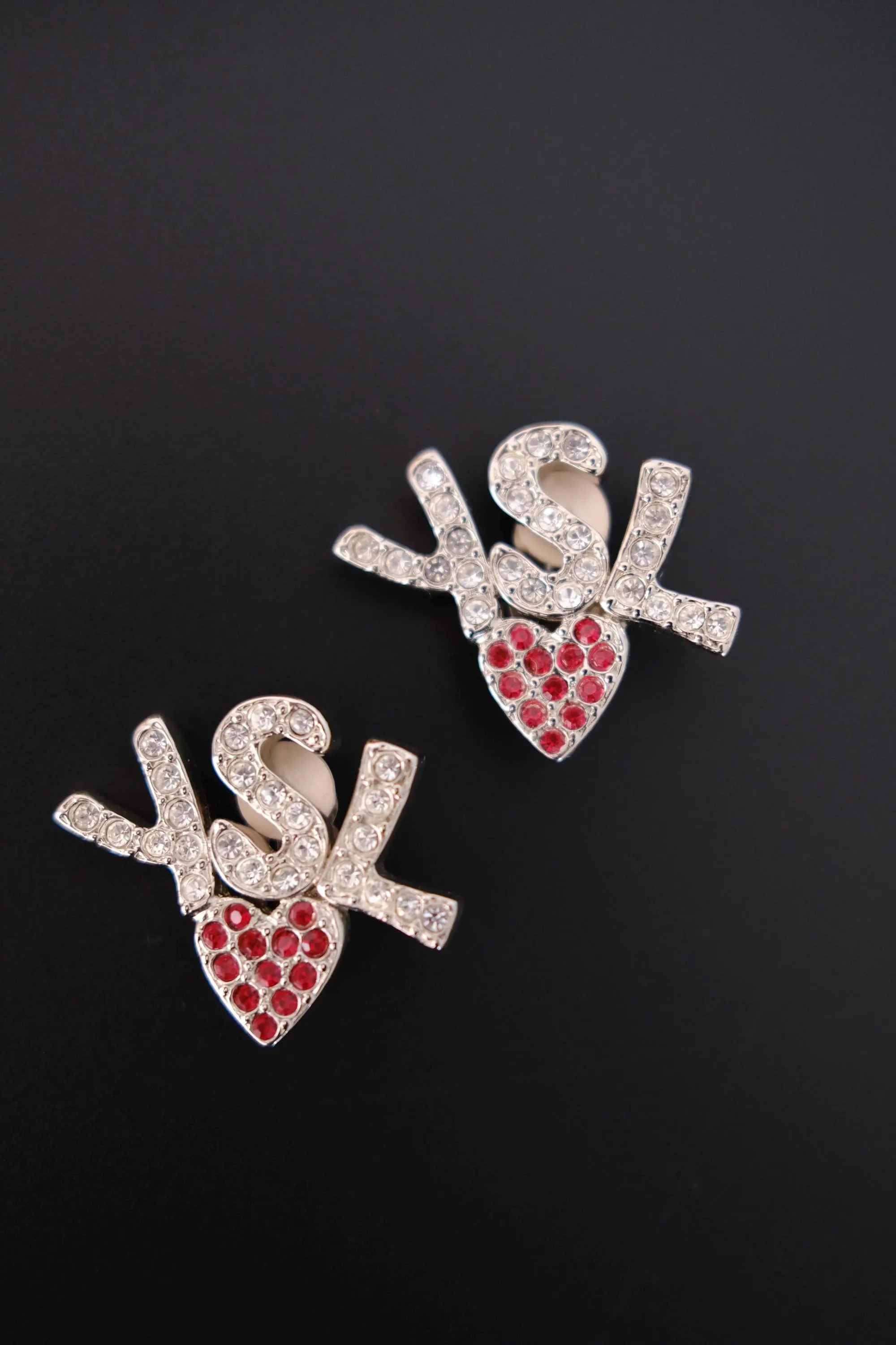 Vintage Yves Saint Laurent YSL crystal heart logo clip-on earrings