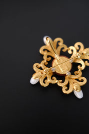 YSL Made in France signature on reverse of vintage Yves Saint Laurent brooch