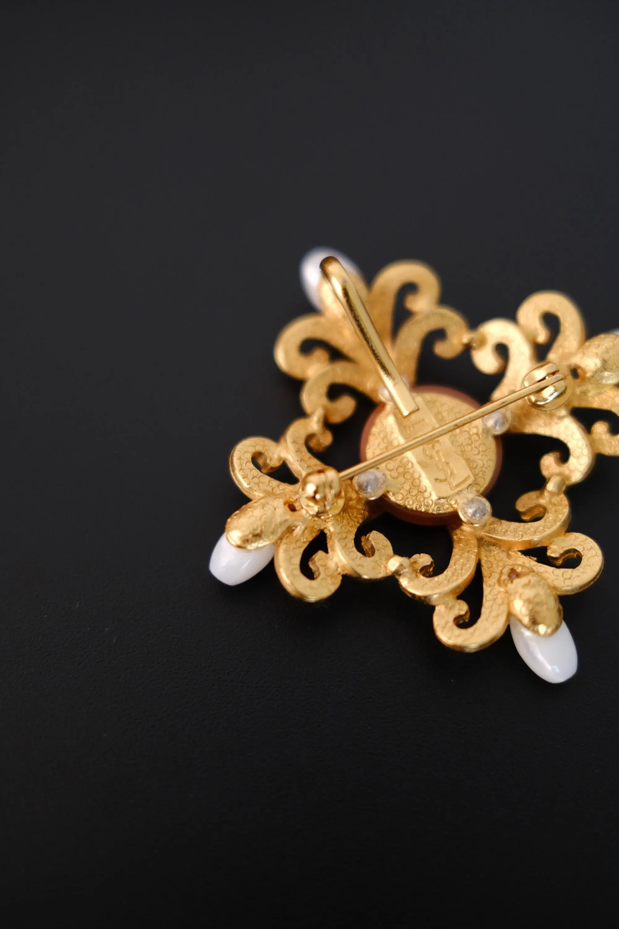 YSL Made in France signature on reverse of vintage Yves Saint Laurent brooch