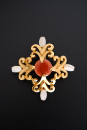 Vintage Yves Saint Laurent YSL faux pearl and reddish orange cabochon gold tone brooch