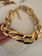 Vintage Yves Saint Laurent YSL gold tone choker necklace with charm, made in France, designer jewelry gift for her