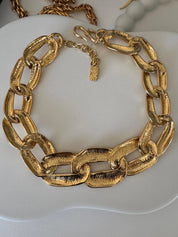 Vintage Yves Saint Laurent YSL gold tone choker necklace with charm, made in France, designer jewelry gift for her
