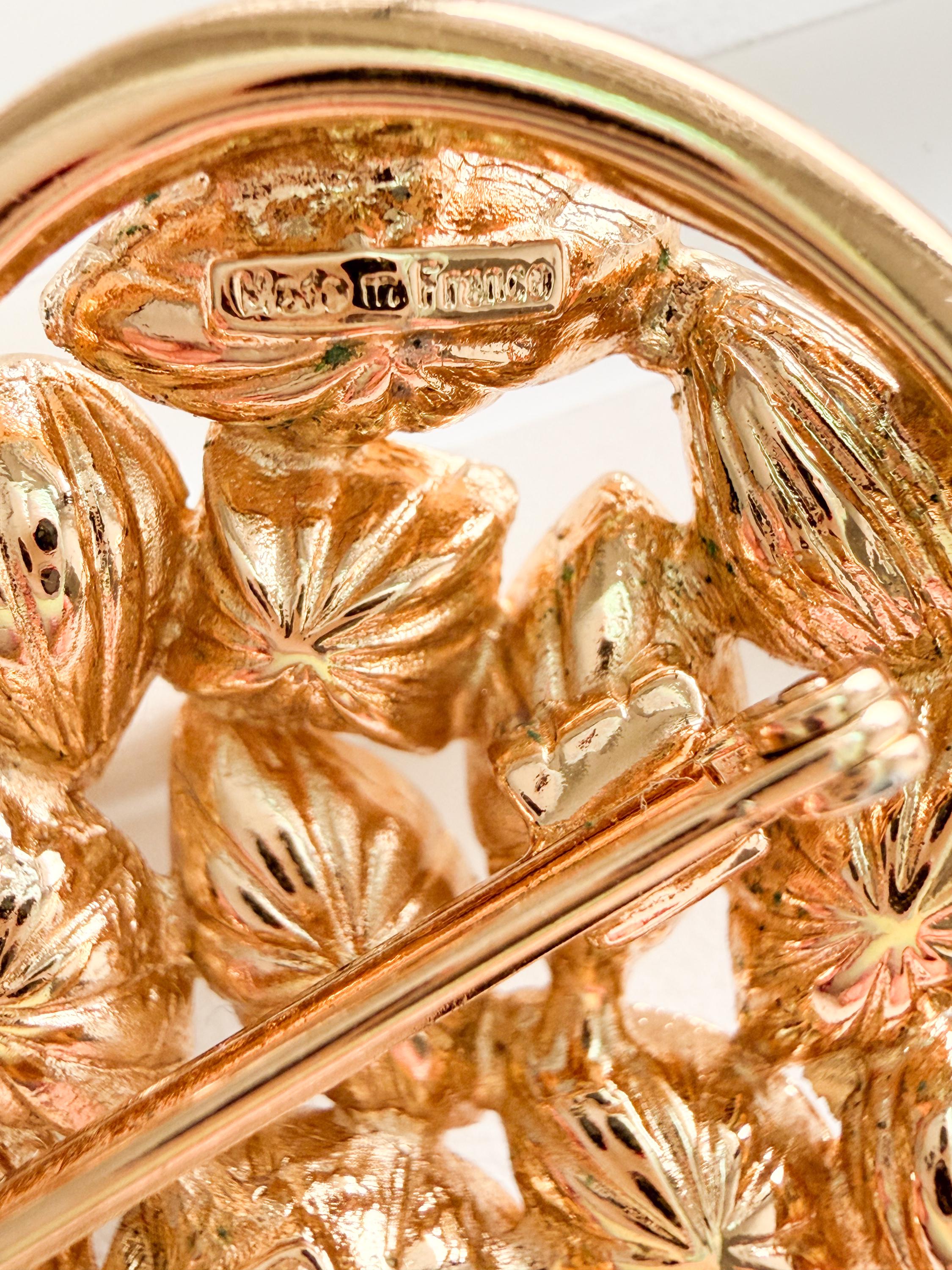 Close up YSL heart brooch gold crystal detail sparkling vintage design