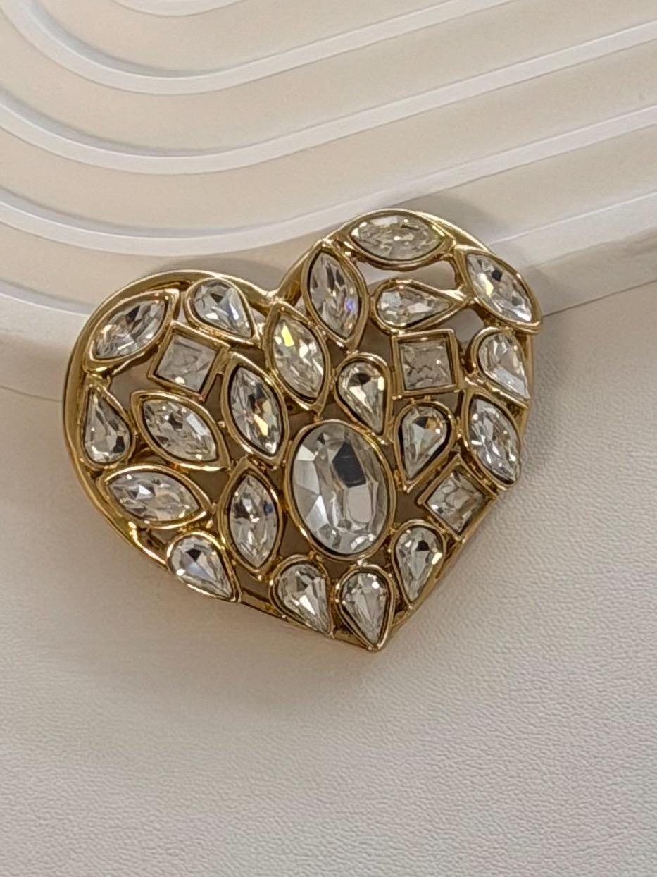 YSL heart brooch gold romantic feminine luxury jewelry design