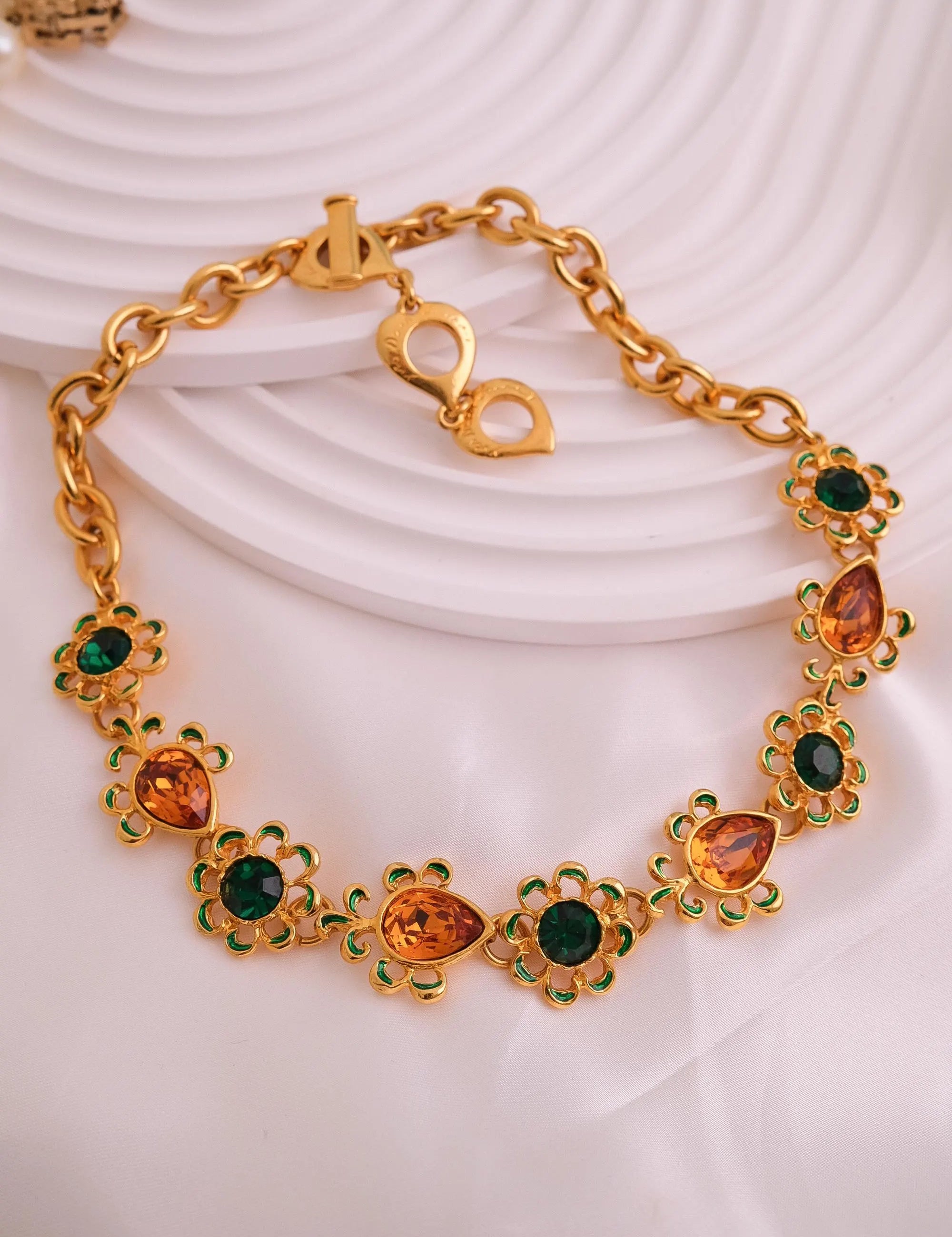 Vintage Yves Saint Laurent Necklace – YSL Gold-Tone Openwork Floral Pendant with Toggle Clasp – 1980s Designer Jewelry – Rare Gift for Her