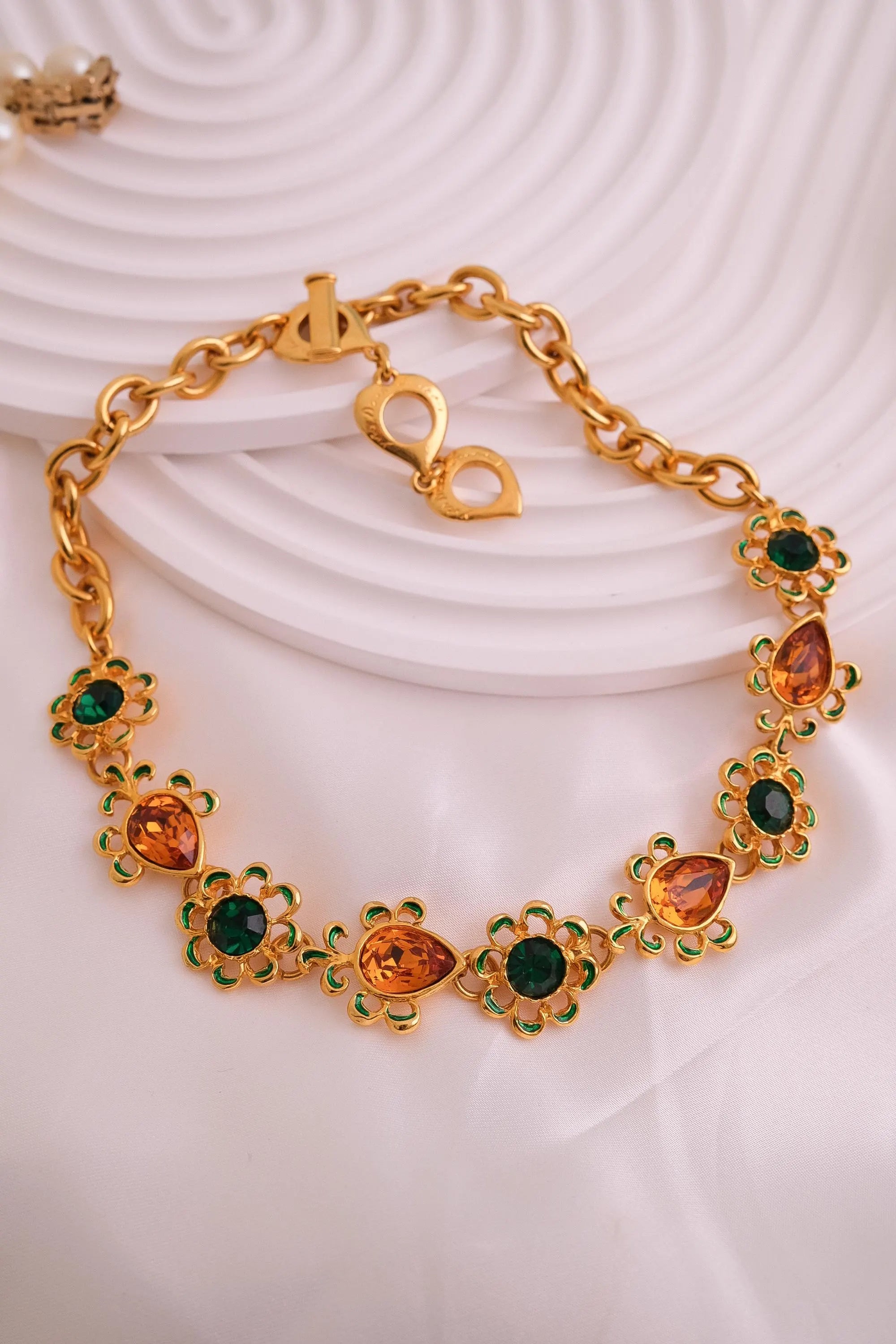 Vintage Yves Saint Laurent Necklace – YSL Gold-Tone Openwork Floral Pendant with Toggle Clasp – 1980s Designer Jewelry – Rare Gift for Her