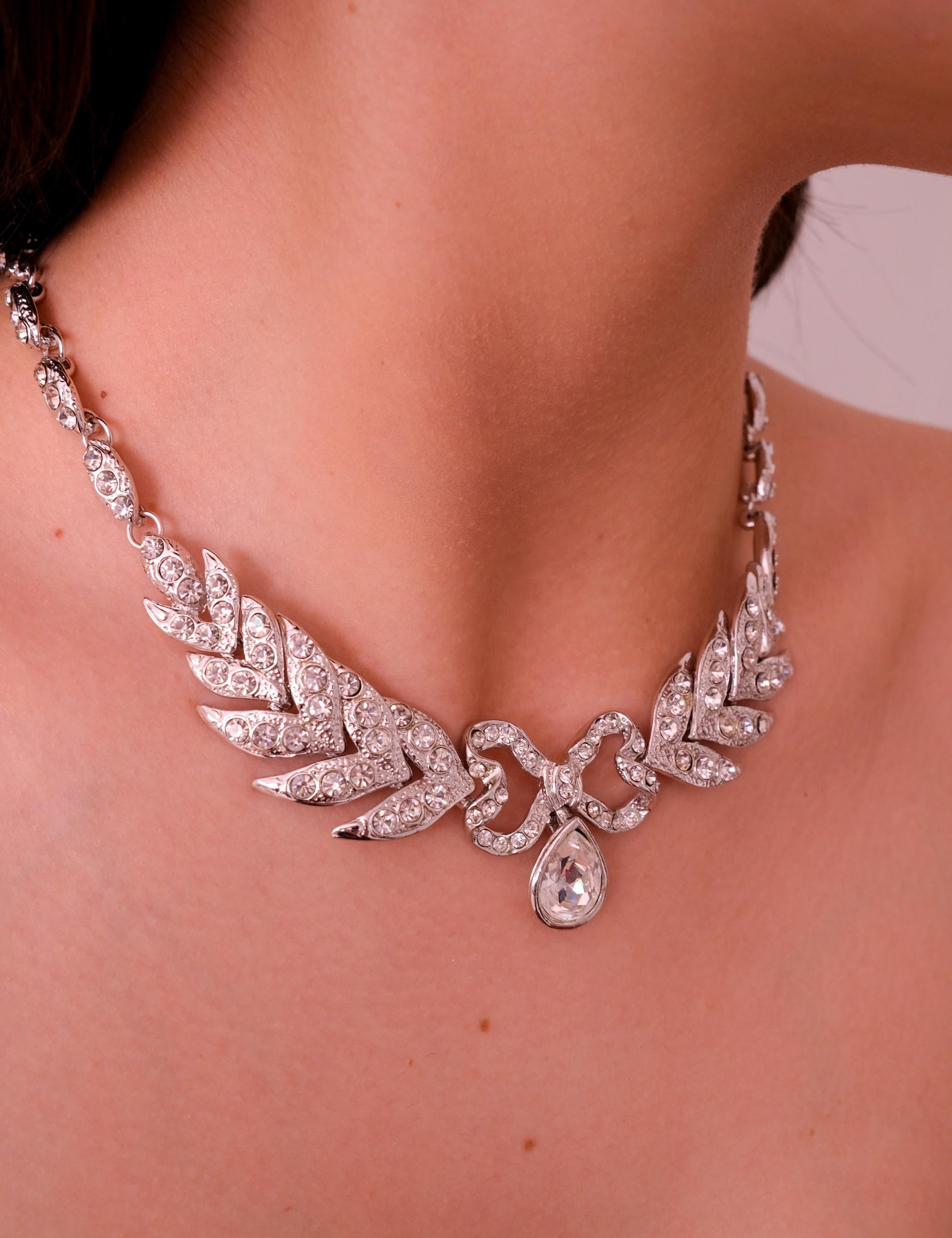 Elegant vintage Yves Saint Laurent YSL silver bow rhinestone choker romantic luxury jewelry