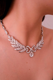 Elegant vintage Yves Saint Laurent YSL silver bow rhinestone choker romantic luxury jewelry