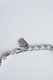Close up YSL bow choker silver rhinestone sparkle detail vintage design