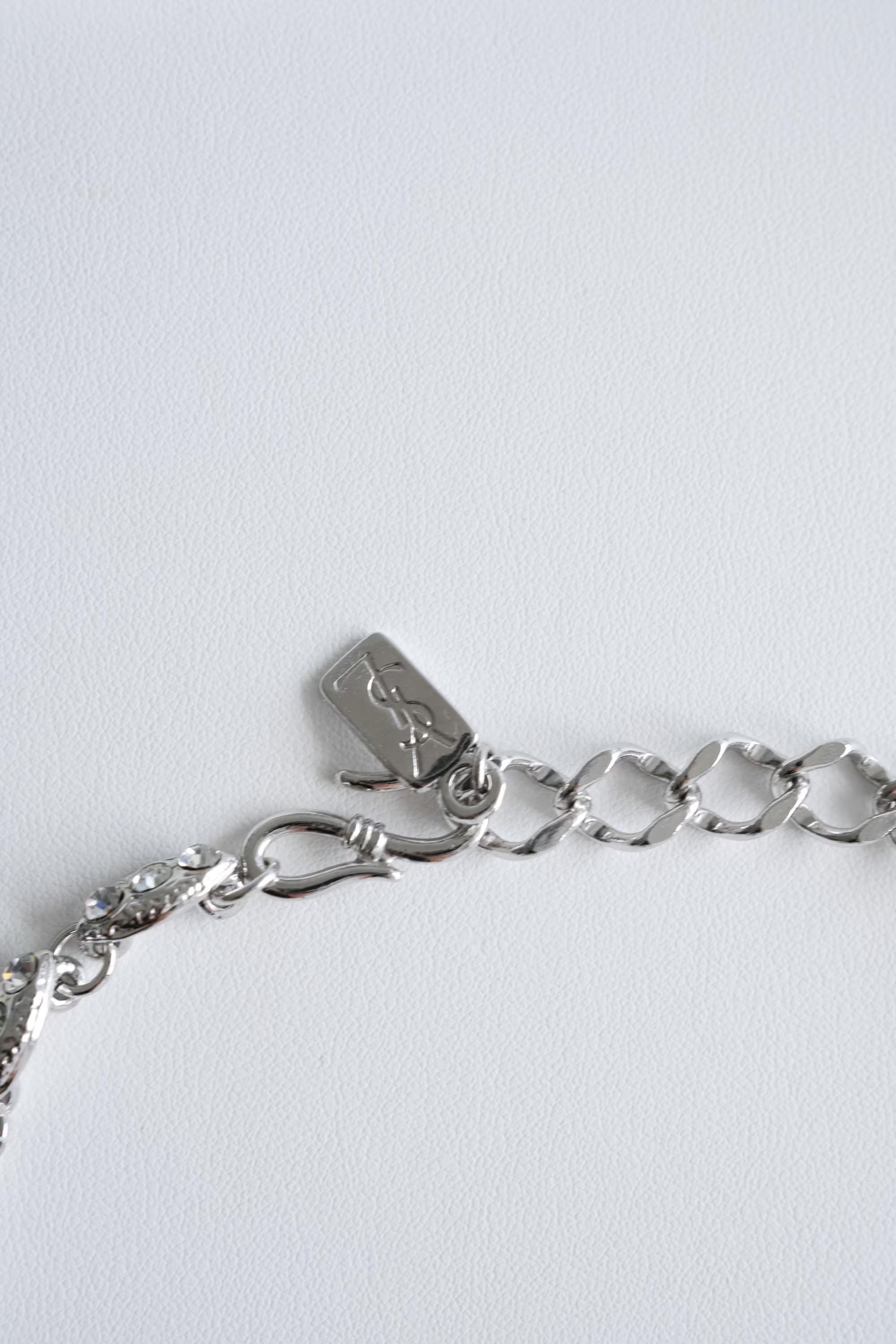 Close up YSL bow choker silver rhinestone sparkle detail vintage design