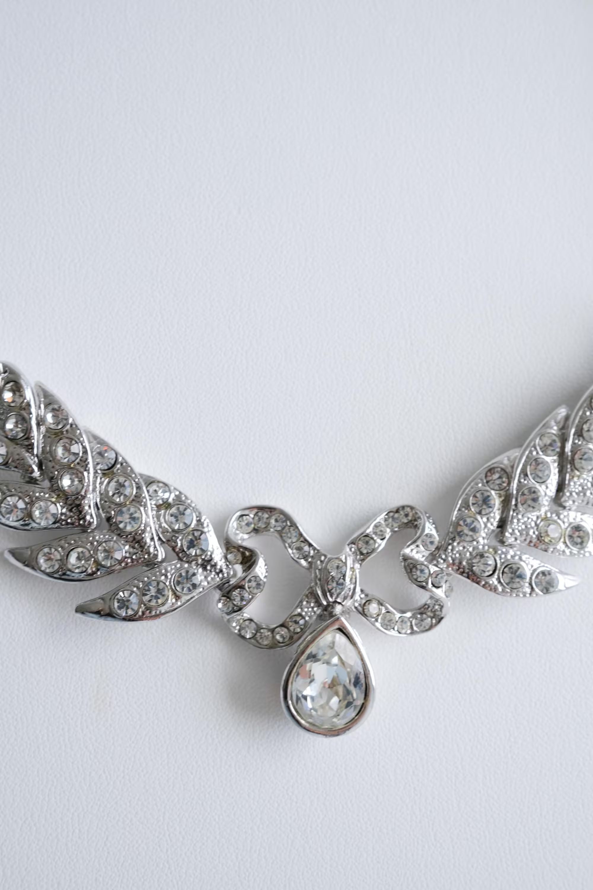 Close up YSL bow choker silver rhinestone sparkle detail vintage design