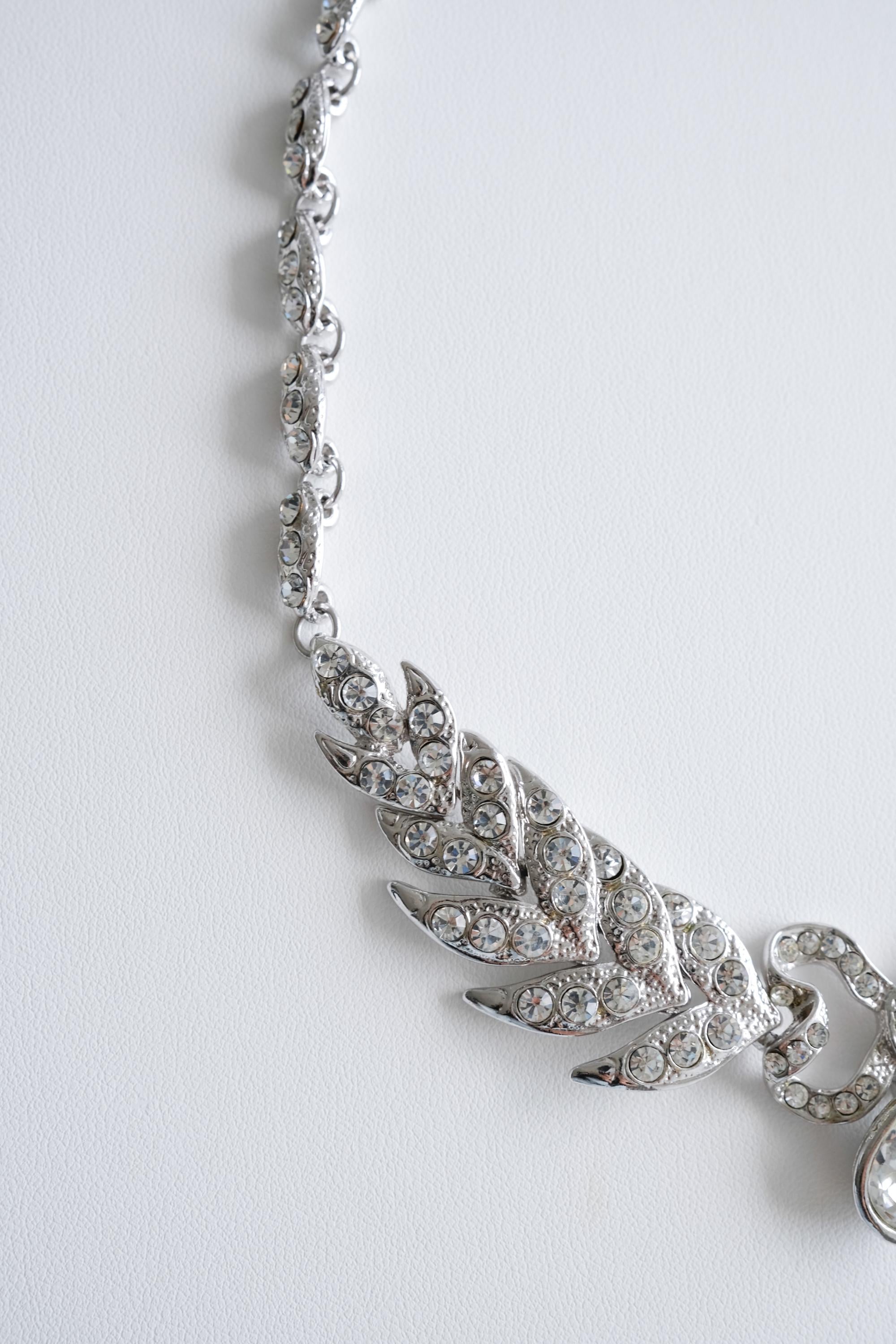 YSL silver bow choker side view sculptural sparkle design