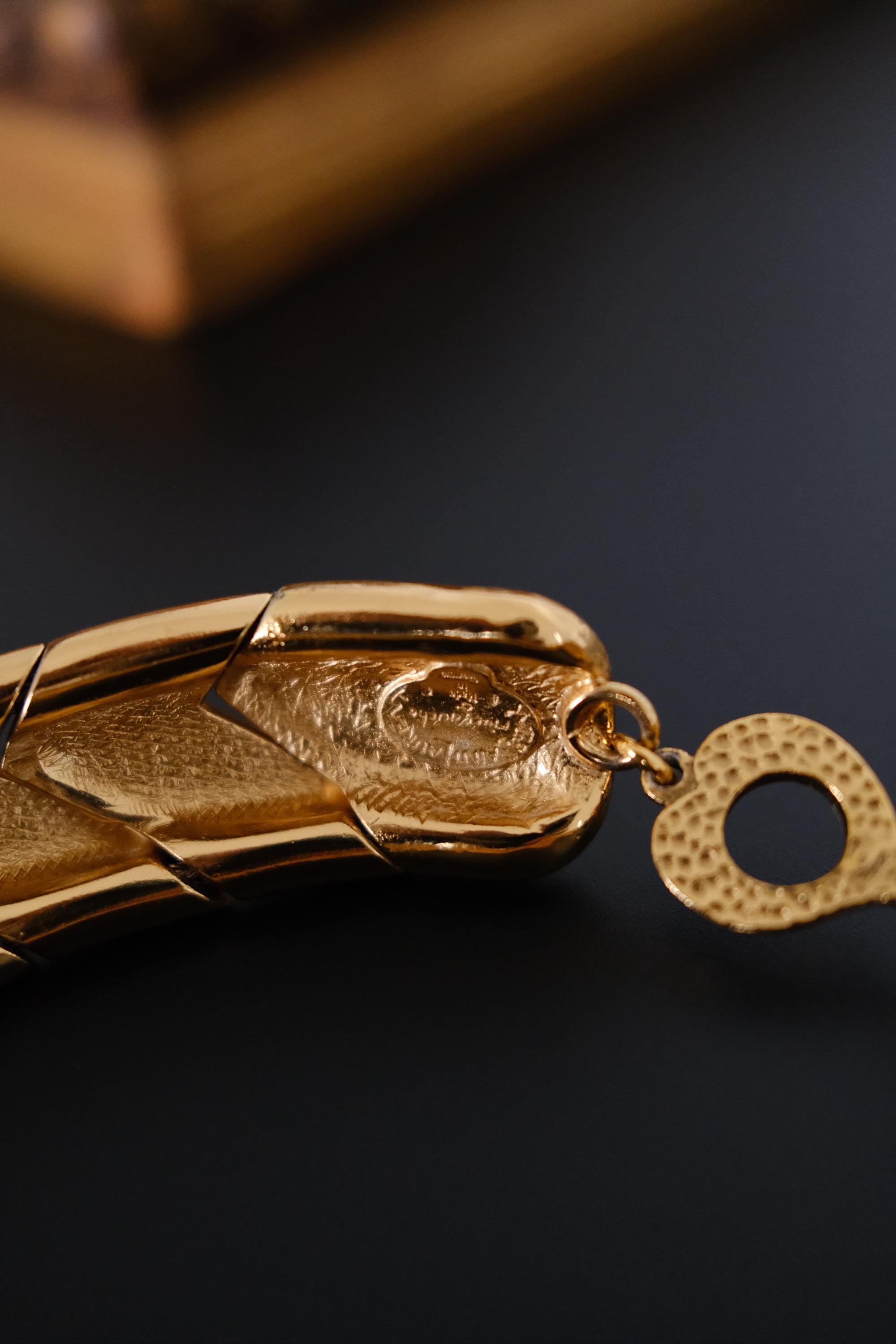 Made in France and YSL stamp details on authentic vintage Yves Saint Laurent gold tone necklace