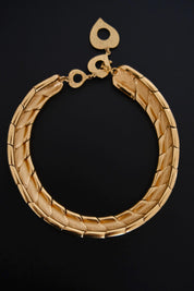 Vintage Yves Saint Laurent gold choker necklace measuring approximately 45 cm long with 2.5 cm maximum width