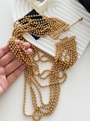 Yves Saint Laurent Vintage Gold Beaded Multi-Strand Choker Necklace – YSL Statement Collar with Signature Bar Clasp – 1980s Designer Jewelry