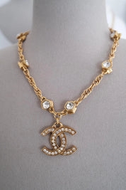 Vintage Chanel gold plated CC logo pendant necklace with crystal from 1990s