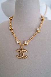 Vintage Chanel gold plated CC logo pendant necklace with crystal from 1990s