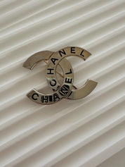 Signed Chanel 98P Made in France on authentic vintage CC brooch