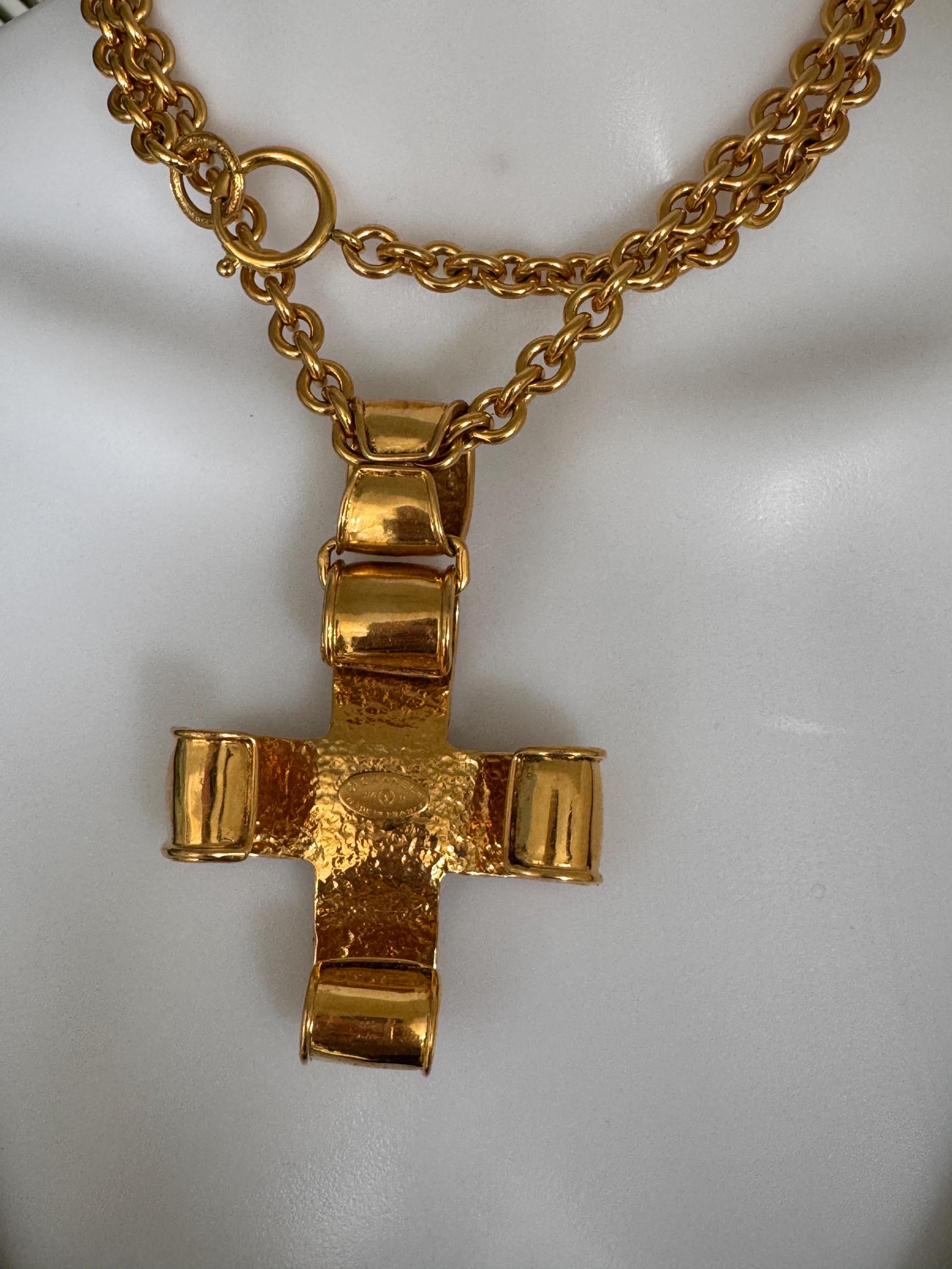 Stamped Chanel ©94 P Made in France on vintage CC cross pendant