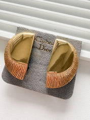 Elegant vintage Christian Dior Germany moon design gold clip on earrings refined luxury jewelry