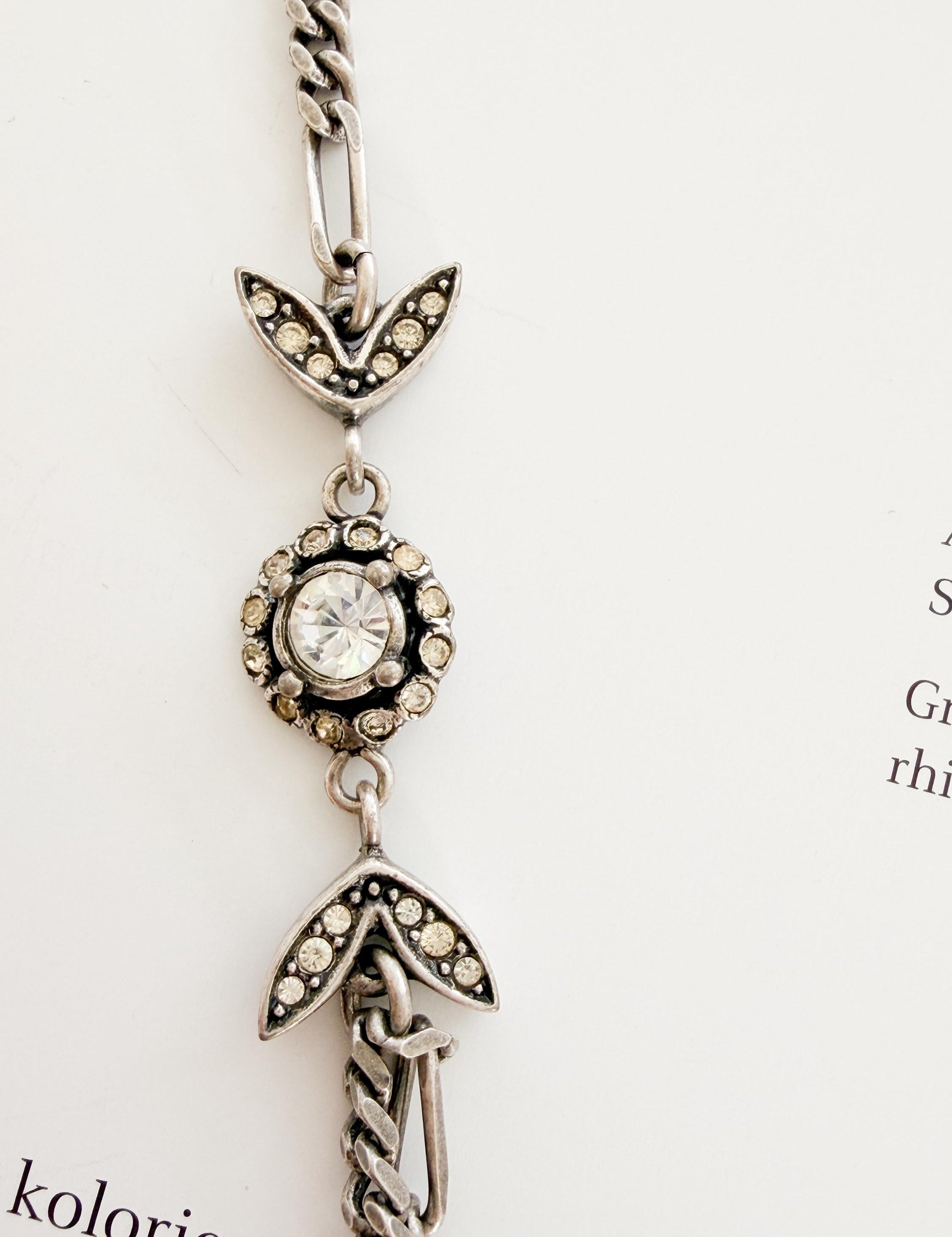 Close-up of sparkling crystal detail on vintage Christian Dior choker necklace