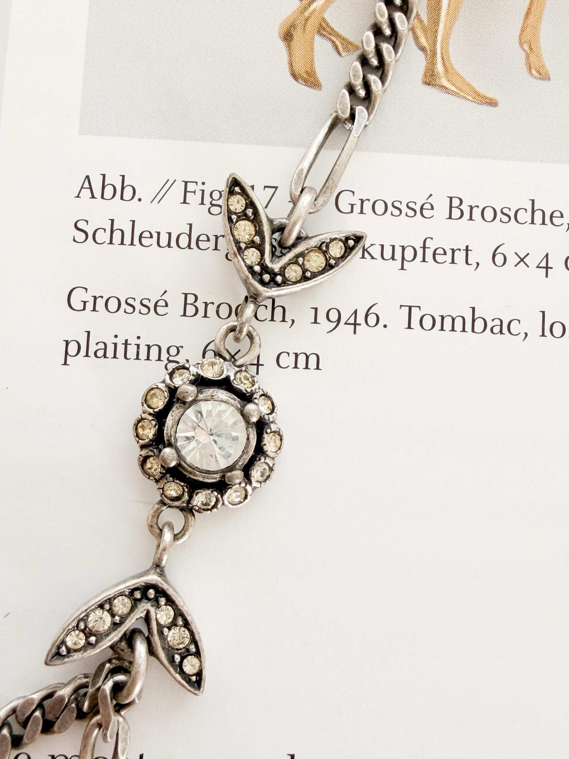 Close-up of sparkling crystal detail on vintage Christian Dior choker necklace