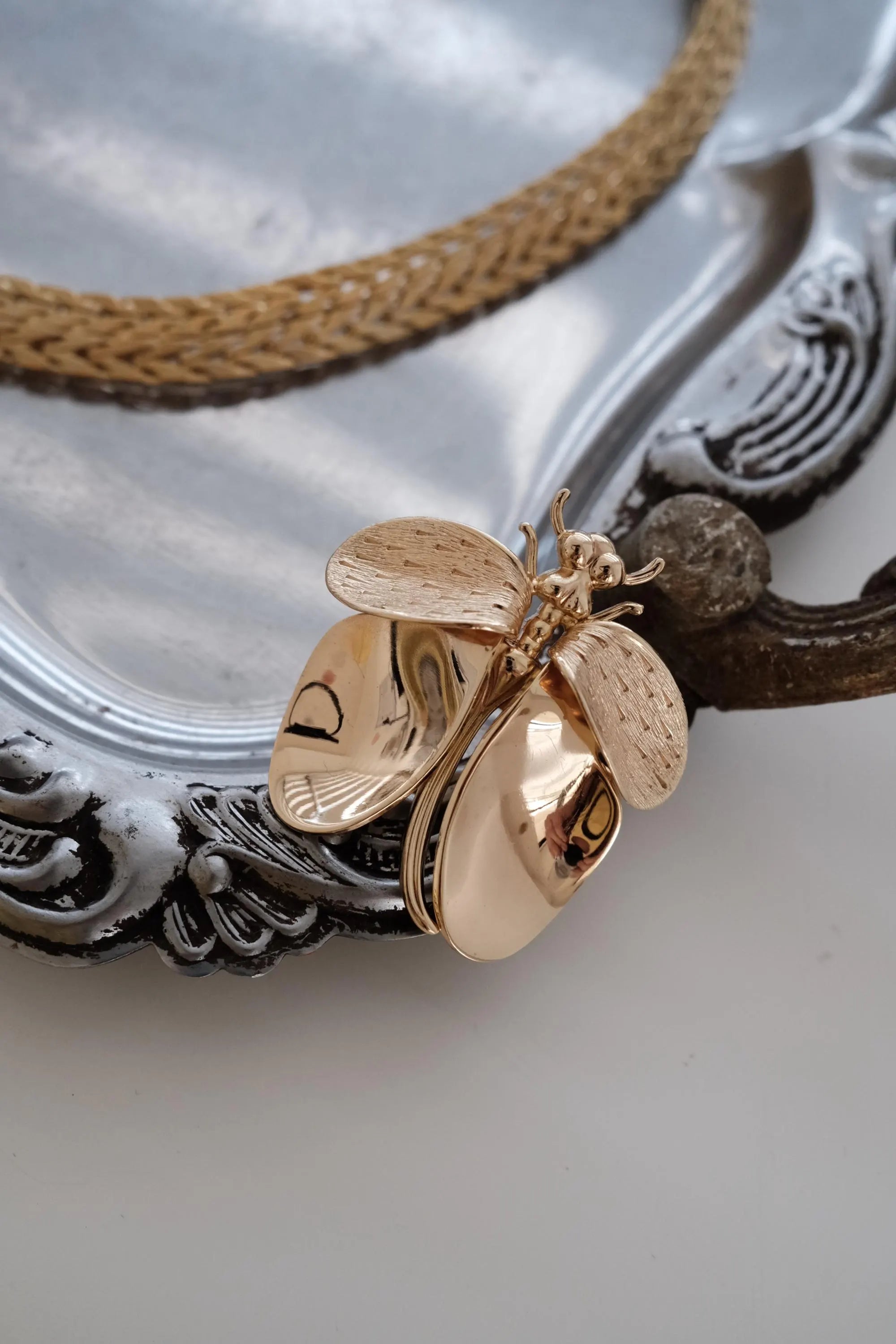 Vintage Christian Dior dragonfly brooch worn as bridal accessory