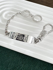Vintage Christian Dior rhinestone charm bracelet in silver tone from John Galliano era