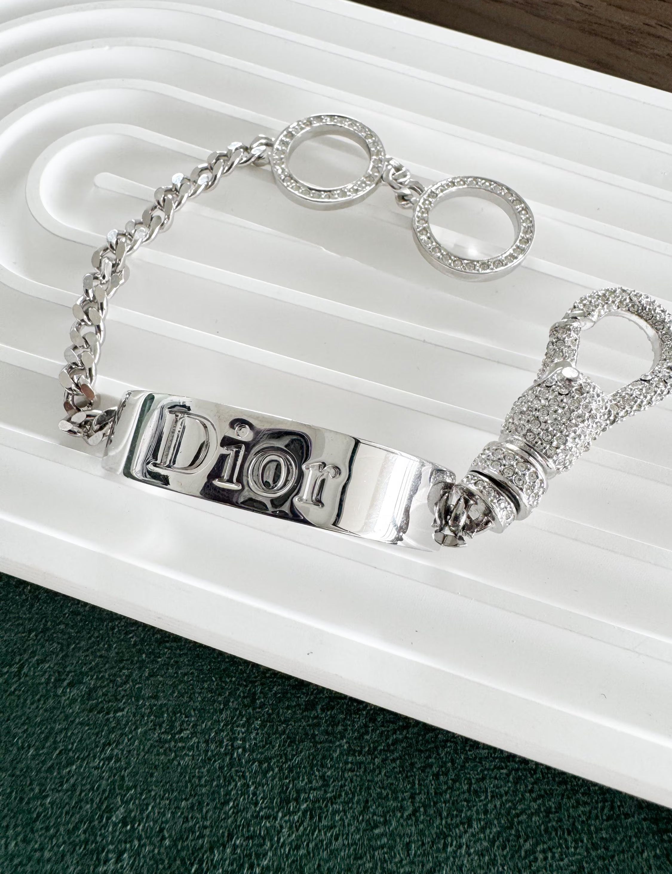 Vintage Christian Dior rhinestone charm bracelet in silver tone from John Galliano era