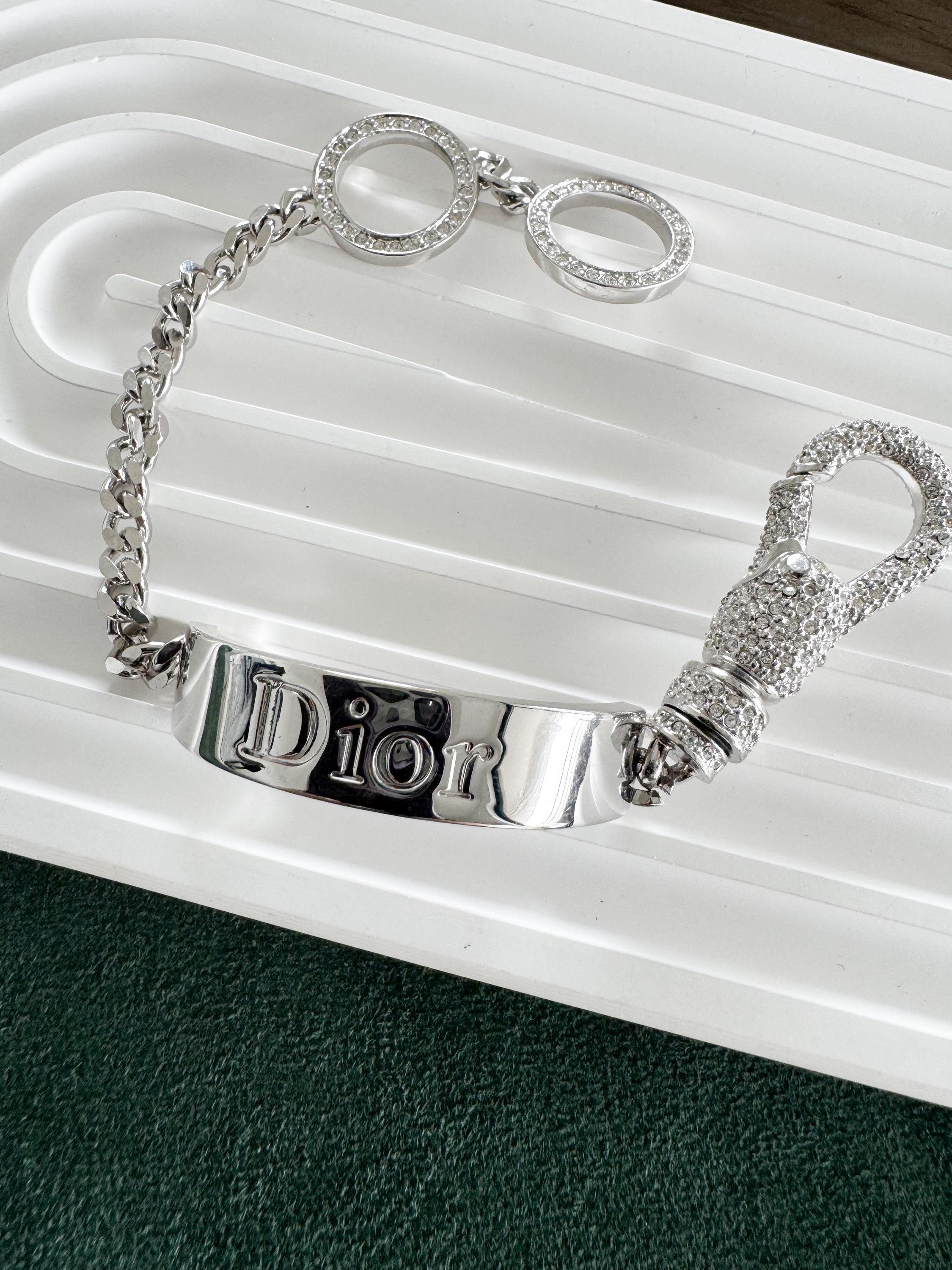 Vintage Christian Dior silver tone rhinestone charm bracelet elegant designer jewelry