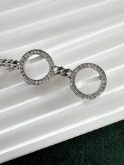 Close-up of Vintage Christian Dior rhinestone charm bracelet silver tone