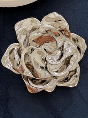Vintage Dior sculptural rose brooch with mirror-like silver tone surface